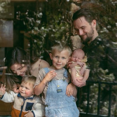 Tom with his wife and three kids